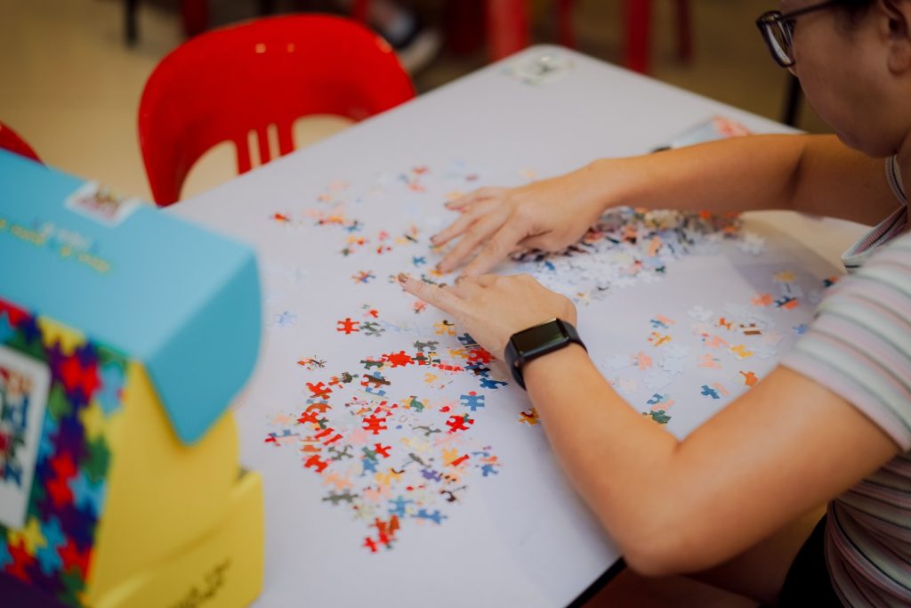 Competitors at work during the Malaysian Jigsaw Puzzle Competition 2025